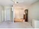 This bright bedroom features light walls, ceiling fan, and hardwood floors in an open space at 437 Eastland Dr, Decatur, GA 30030