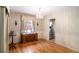 Elegant dining room with classic wallpaper, chandelier, and hardwood floors at 437 Eastland Dr, Decatur, GA 30030