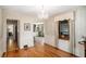 Charming dining area with hardwood floors, wainscoting, and classic details at 437 Eastland Dr, Decatur, GA 30030