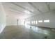 Spacious garage area offering ample room for parking and storage with bright overhead lighting at 5780 Punkintown Rd, Douglasville, GA 30135