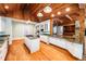 Kitchen featuring granite countertops, stainless steel appliances, and a large center island at 5780 Punkintown Rd, Douglasville, GA 30135