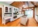 Spacious eat-in kitchen with a center island, wood ceiling, and stainless steel appliances at 5780 Punkintown Rd, Douglasville, GA 30135