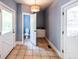 Open mud room leads to a half bath and an additional sink and counterspace at 5780 Punkintown Rd, Douglasville, GA 30135