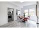 Breakfast nook features views to kitchen, outdoor scenery, and stylish breakfast table at 1424 Van Epps Se Ave, Atlanta, GA 30316