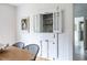 Dining room featuring a built-in hutch with glass doors for displaying dishware and glassware at 1424 Van Epps Se Ave, Atlanta, GA 30316