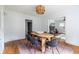 Bright dining room with a wood table, stylish chairs, and a vintage rug at 1424 Van Epps Se Ave, Atlanta, GA 30316