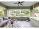 Inviting front porch with ceiling fan, seating area, and views of the neighborhood at 1424 Van Epps Se Ave, Atlanta, GA 30316