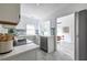 Bright kitchen with granite countertops, stainless steel appliances, and tile backsplash at 1424 Van Epps Se Ave, Atlanta, GA 30316