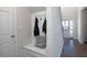 Mudroom featuring built-in bench with coat hooks near the front door, convenient for storage at 1678 Lacebark Elm Way Way, Lawrenceville, GA 30045