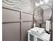 Chic powder room featuring modern fixtures, decorative wallpaper, and a vessel sink at 403 Defoors Mill Nw Dr, Atlanta, GA 30318