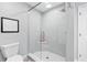 Contemporary bathroom features glass enclosed shower with white subway tile and modern fixtures at 403 Defoors Mill Nw Dr, Atlanta, GA 30318