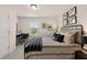 Stylish bedroom with artwork, a modern bed, and a dedicated desk area for work or study at 1019 Merritt Dr # 102, Villa Rica, GA 30180