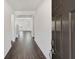 Open-concept entryway featuring hardwood flooring and a view into the main living area at 141 Bennett Farm Dr, Loganville, GA 30052