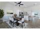 Open-concept kitchen and dining area with modern appliances and ample seating at 1491 Black Hickory Pl, Norcross, GA 30093