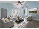 Cozy living room with comfortable seating, natural light, and stylish decor at 1491 Black Hickory Pl, Norcross, GA 30093
