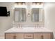 Bathroom with double vanity, marble countertop, and gold hardware at 230 Bristol Stone Ct, Johns Creek, GA 30005