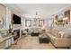 Inviting living room with neutral decor, fireplace, and ample seating at 230 Bristol Stone Ct, Johns Creek, GA 30005