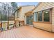 Expansive back deck with multiple access points, perfect for outdoor gatherings and enjoying the natural surroundings at 3032 Ross Rd, Snellville, GA 30039