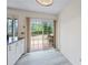 Bright dining area with sliding glass doors leading to the deck, creating seamless indoor-outdoor living at 3032 Ross Rd, Snellville, GA 30039