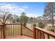 Outdoor view from deck of green grass, trees, and a blue sky at 3032 Ross Rd, Snellville, GA 30039