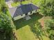 Aerial view of a spacious backyard with mature trees and well-maintained lawn at 4002 Lindsey Dr, Decatur, GA 30035