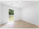 Bright bedroom features a window that provides ample natural light and a pleasant view at 4002 Lindsey Dr, Decatur, GA 30035