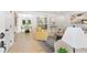 Bright open-concept living space with hardwood floors, neutral decor, and seamless flow to kitchen at 4002 Lindsey Dr, Decatur, GA 30035