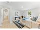 Bright main bedroom with view to hallway, black accent table, and a large comfortable bed at 4002 Lindsey Dr, Decatur, GA 30035