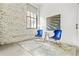 Modern bedroom with barn door, large window, and exposed brick accents at 434 Marietta St Nw # 401, Atlanta, GA 30313