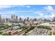 A stunning cityscape view with modern high-rise buildings under a bright, cloudy sky at 434 Marietta St Nw # 401, Atlanta, GA 30313