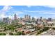 Scenic aerial view of the city skyline with lush greenery and clear blue skies at 434 Marietta St Nw # 401, Atlanta, GA 30313