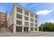 Commercial building with large windows, painted brick exterior, and street-level access on a clear day at 434 Marietta St Nw # 401, Atlanta, GA 30313