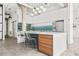 Spacious kitchen with an island, stainless steel appliances, tile backsplash, and open layout to the rest of the home at 434 Marietta St Nw # 401, Atlanta, GA 30313