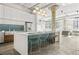 Modern kitchen featuring an island with seating, stainless steel appliances, and a subway tile backsplash, offering sleek design at 434 Marietta St Nw # 401, Atlanta, GA 30313