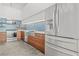 Modern kitchen features stainless steel appliances, wood cabinets, and a stylish tile backsplash, combining functionality and design at 434 Marietta St Nw # 401, Atlanta, GA 30313