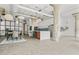 Bright, open living space showcasing a dining area and a modern kitchen with stainless steel appliances and island seating at 434 Marietta St Nw # 401, Atlanta, GA 30313