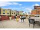 Spacious rooftop deck with outdoor seating, dining area, and cityscape views at 434 Marietta St Nw # 401, Atlanta, GA 30313