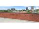 Rooftop view with brick wall and cityscape in the background at 434 Marietta St Nw # 401, Atlanta, GA 30313