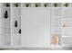 Stylish wall bed with shelving and decorative items for compact living at 434 Marietta St Nw # 401, Atlanta, GA 30313