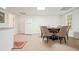 Finished basement featuring a poker table, chairs, and a refrigerator at 1328 Amberwood Dr, Woodstock, GA 30189