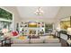 Inviting living room with fireplace, built-ins, and plenty of natural light from large windows at 1328 Amberwood Dr, Woodstock, GA 30189