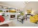 Cozy living room featuring a fireplace with built-in shelving, perfect for relaxation at 1328 Amberwood Dr, Woodstock, GA 30189
