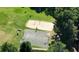 Aerial view of recreational area featuring a basketball court, volleyball court, and picnic area at 1328 Amberwood Dr, Woodstock, GA 30189