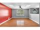 Bedroom with wood floors, two skylights, and multiple windows for natural light at 1822 Oriole Trl, Lithia Springs, GA 30122