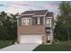 Charming two-story home with a brick and gray facade, attached two car garage, and lush front lawn at 1878 Copelyn Reese Court (Lot 169), Lawrenceville, GA 30043