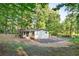 Charming home with surrounding mature trees and a large front yard at 4212 Bryan Se Dr, Acworth, GA 30102
