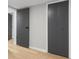 Hallway with paneled doors and light hardwood floors at 4212 Bryan Se Dr, Acworth, GA 30102