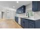 Modern kitchen with white countertops, stainless steel sink, and navy cabinetry at 4212 Bryan Se Dr, Acworth, GA 30102