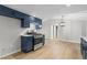 View of the kitchen with stainless steel oven and navy cabinets at 4212 Bryan Se Dr, Acworth, GA 30102