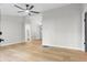 Bright living room features a modern ceiling fan and light wood flooring, offering a stylish and airy atmosphere at 4212 Bryan Se Dr, Acworth, GA 30102